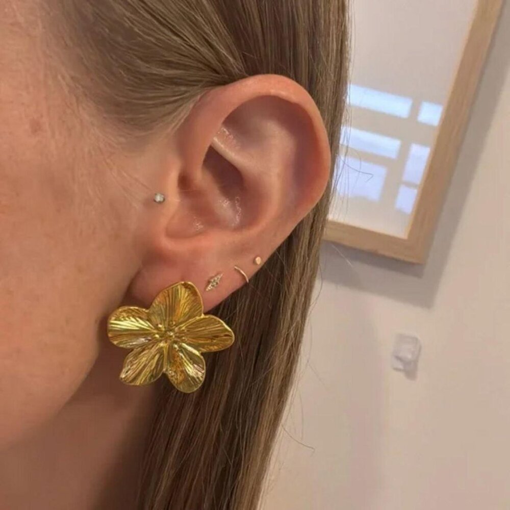 The Audrey Big gold flower stud earrings, dress up any outfit